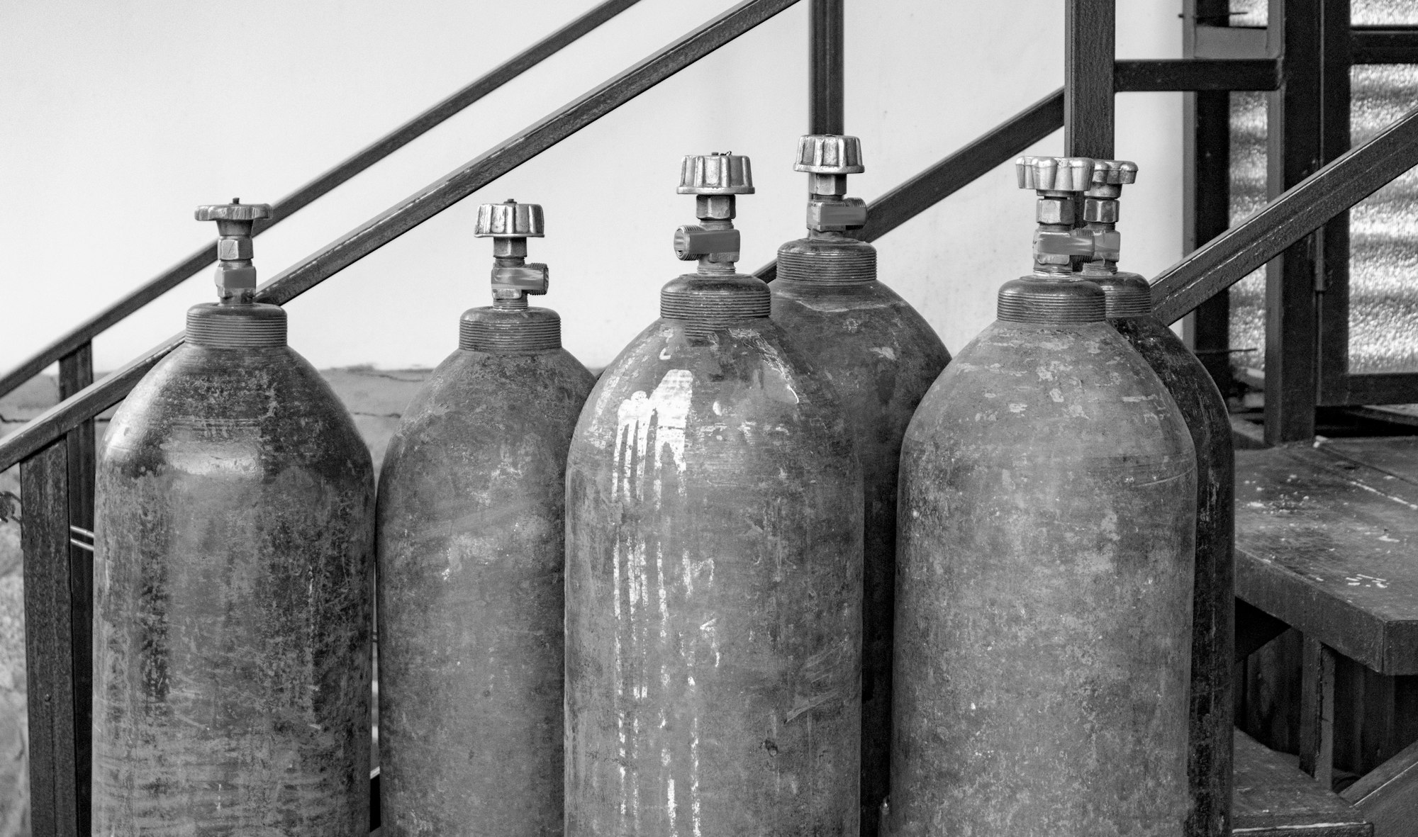 Close-up of steel cylinders with compressed gas - argon, carbon dioxide or oxygen for welding,
